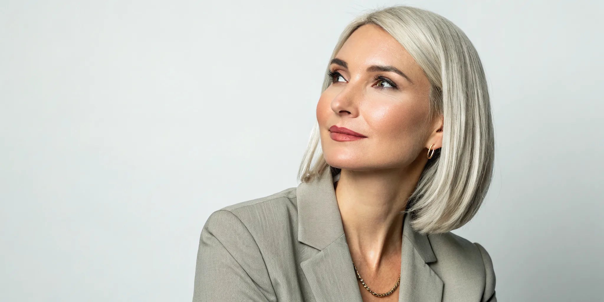 Woman wearing a sleek bob frontal wig with a flawless and natural hairline.