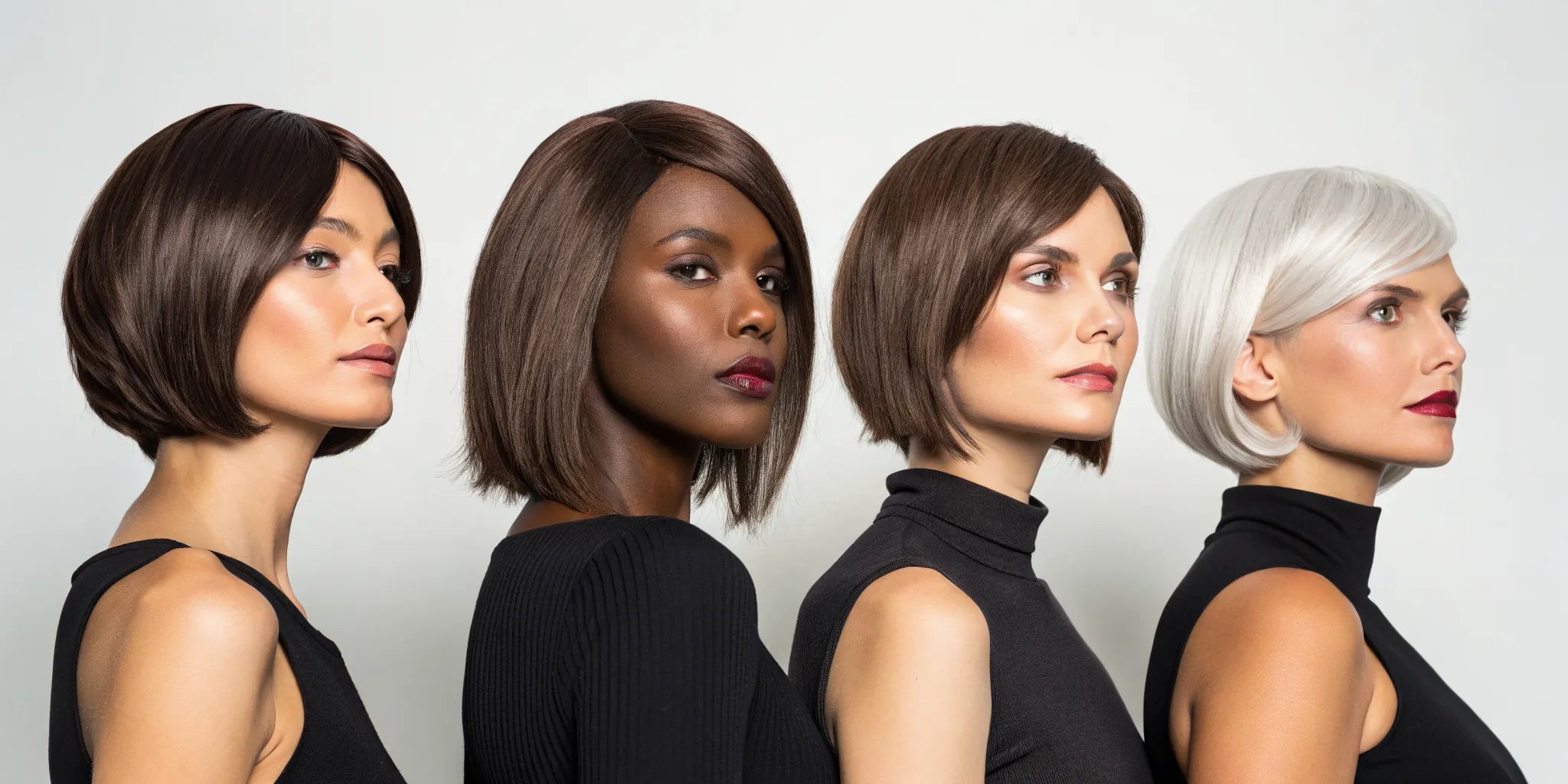 Women modeling a variety of popular short style wigs in different colors and textures.