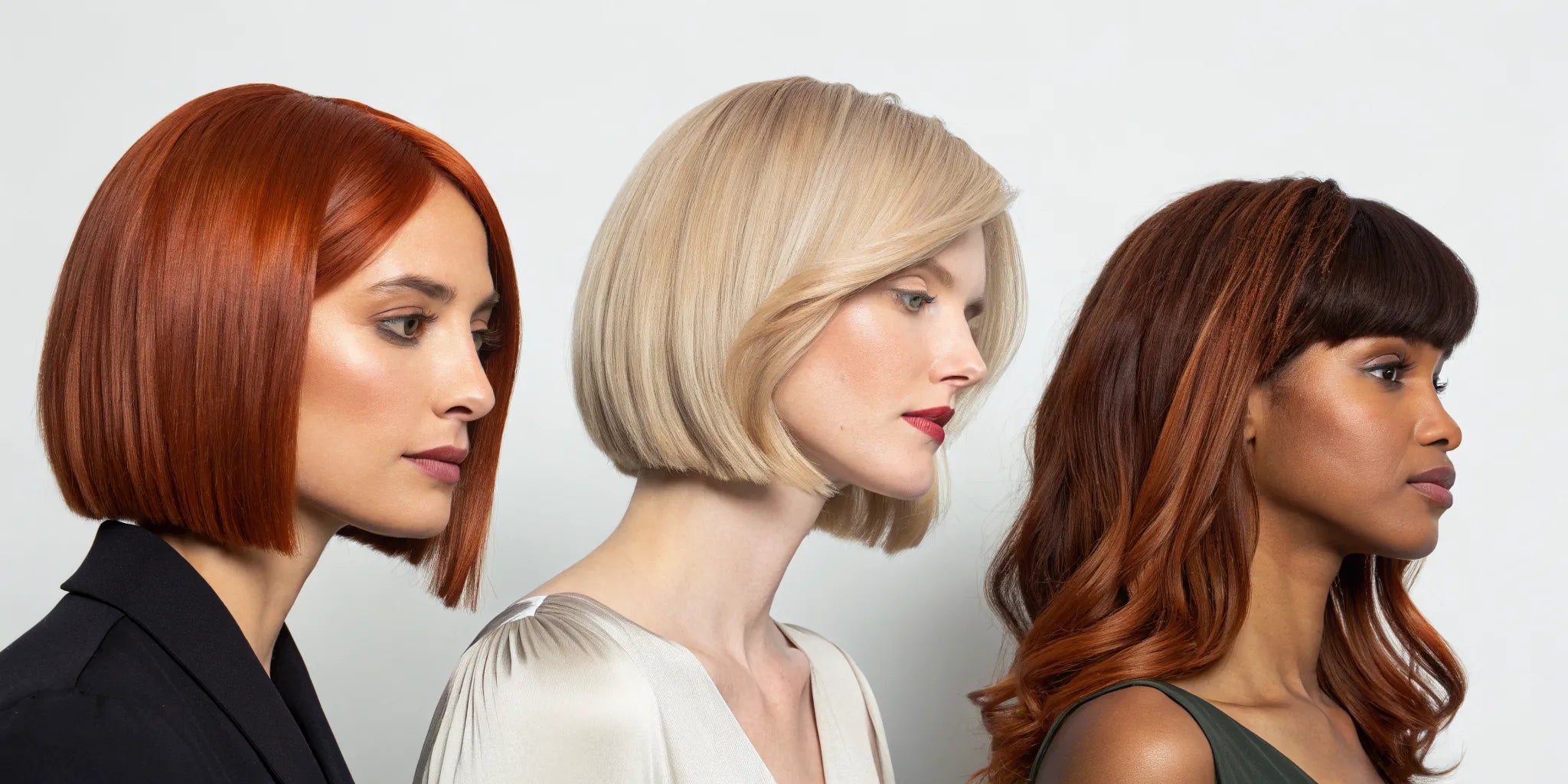 Three women wearing stylish ginger wigs in various lengths and styles.