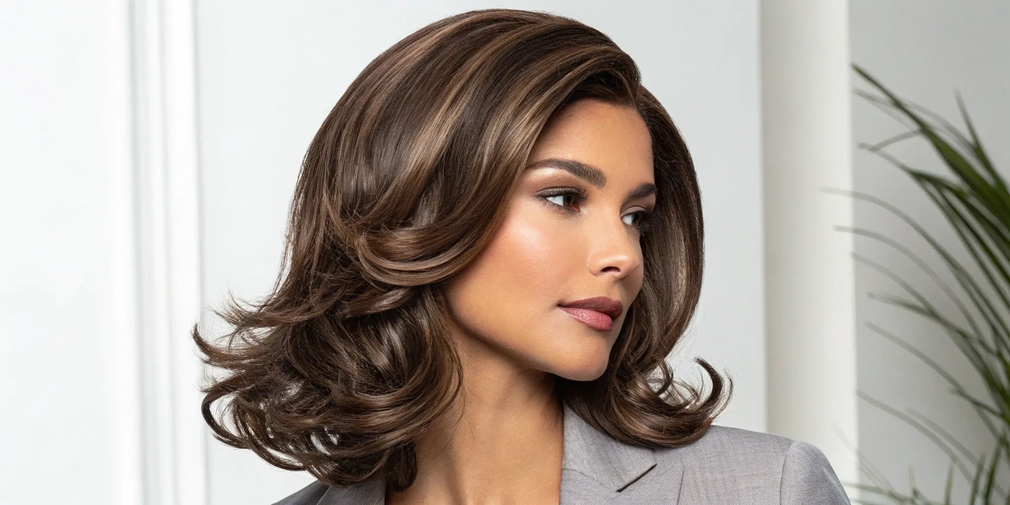 A woman with a U-part wig blended seamlessly for a natural, voluminous hairstyle.